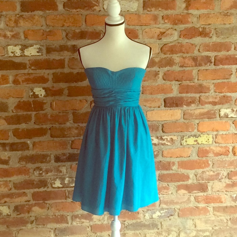 Woman’s Turquoise Cocktail Dress